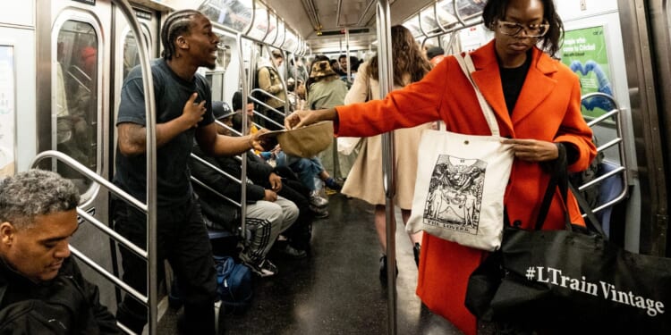 Attacker on the Run After Violent Queens Subway Slashing Incident