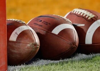 Brawl Erupts During High School Football Playoff Game Leading To Player Blasting Opponent With His Own Helmet