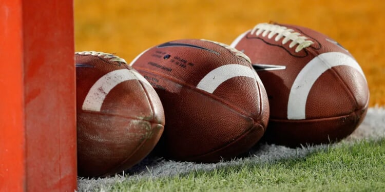 Brawl Erupts During High School Football Playoff Game Leading To Player Blasting Opponent With His Own Helmet