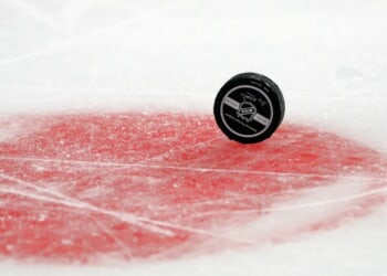 Ceremonial Puck Drop Turns Into Player Getting Bitten By Police Dog At Hockey Game