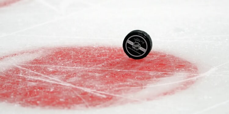 Ceremonial Puck Drop Turns Into Player Getting Bitten By Police Dog At Hockey Game