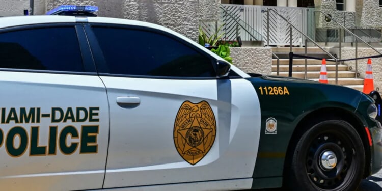 Chaotic Video Footage Seemingly Shows Police Forcibly Taking Island Boys Member Into Custody