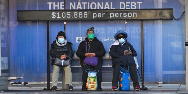 DOUGLAS CARSWELL: Those Dark Clouds Are The Debt