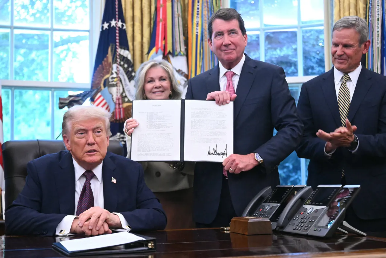 Tennessee Gov. Bill Lee (R-TN) (R) looks on as US Sen. Marsha Blackburn (R-TN) (2L) and US Sen. Bill Hagerty (R-TN) hold an order signed by US President Donald Trump (L) sending National Guard troops to Memphis, in the Oval Office of the White House in Washington, DC, on September 15, 2025. US President Donald Trump said on September 15 he was signing an order sending a federal "task force" including National Guard troops to the city of Memphis, in the latest stage of his crime crackdown that critics have branded authoritarian. "The effort will include the National Guard as well as the FBI" and other federal agencies, Trump told reporters at a signing ceremony in the Oval Office, adding that it was "very important because of the crime that's going on." (Photo by SAUL LOEB / AFP) (Photo by SAUL LOEB/AFP via Getty Images)