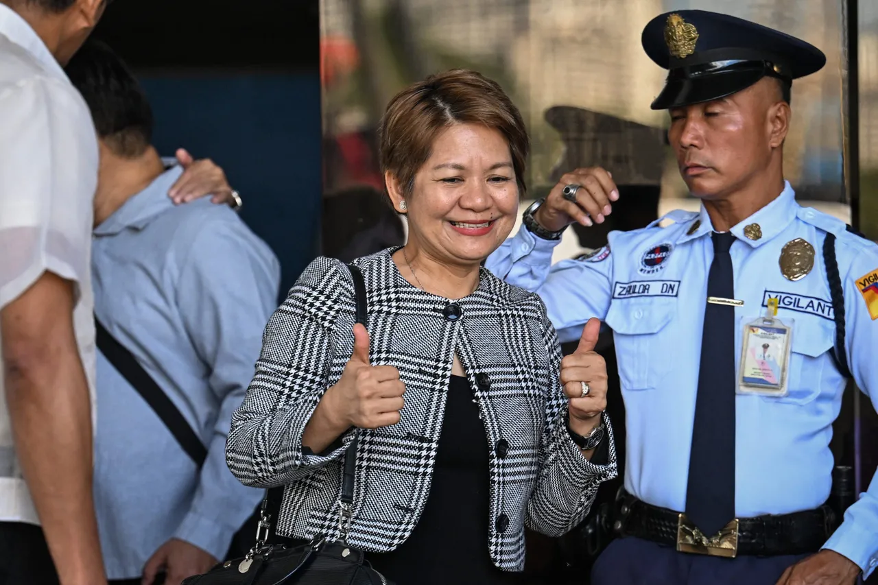 State prosecutor Olivia Torrevillas gestures after the verdict and sentencing at the Pasig Regional Trial Court on November 20, 2025. (Photo by JAM STA ROSA/AFP via Getty Images)