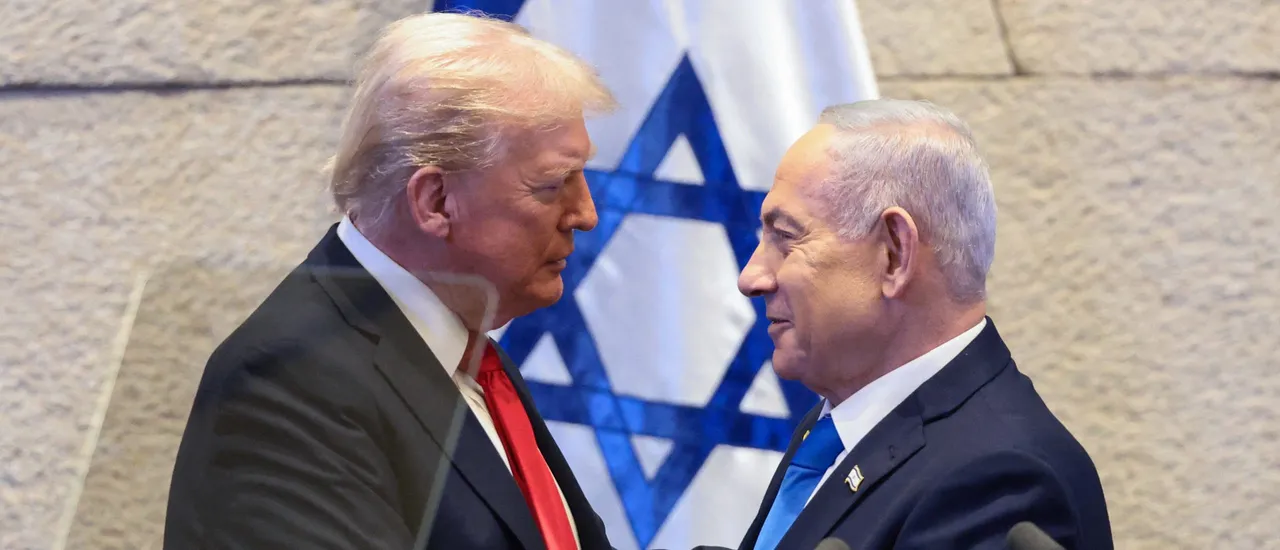 US President Donald Trump speaks with Israeli Prime Minister Benjamin Netanyahu at the Israeli parliament, the Knesset, in Jerusalem on October 13, 2025.