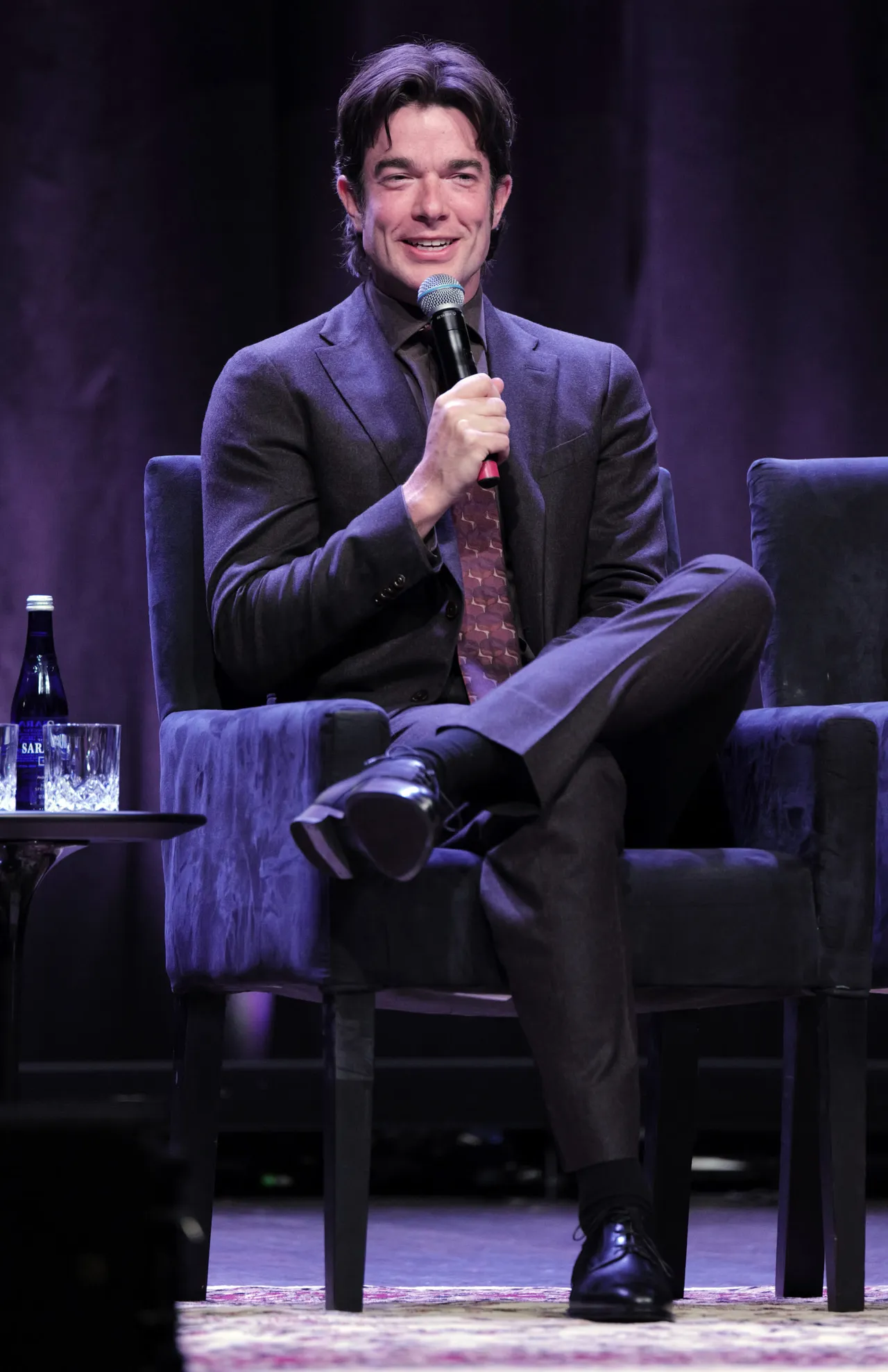 NEW YORK, NEW YORK - OCTOBER 27: John Mulaney speaks on stage during Broadway Preview: 