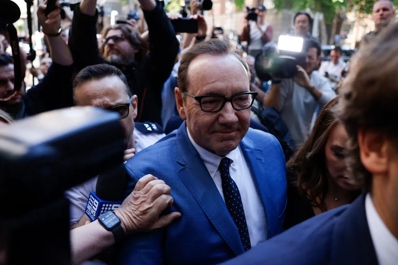 US actor Kevin Spacey arrives at the Westminster Magistrates' Court, in London to attend the opening of his trial, on June 16, 2022 in order to face charges of four counts of sexual assault. - Kevin Spacey, 62 and two-time Oscar winner for "The Usual Suspects" and "American Beauty", was formally charged by police in the British capital earlier in the week.Police and prosecutors have said the first two charges of sexual assault date from March 2005 in London and concern the same man, who is now in his 40s. The third is alleged to have happened in London in August 2008 against a man who is now in his 30s. The fourth sexual assault charge is alleged to have occurred in Gloucestershire, western England, in April 2013 against a third man, who is now in his 30s. (Photo by CARLOS JASSO / AFP) (Photo by CARLOS JASSO/AFP via Getty Images)
