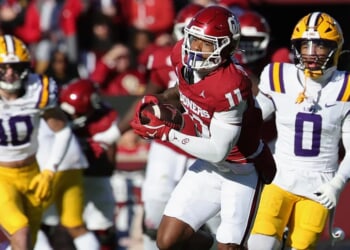 LSU Staffers Wrestle It Out With Oklahoma Fan In Incredibly Wild Pre-Game Video