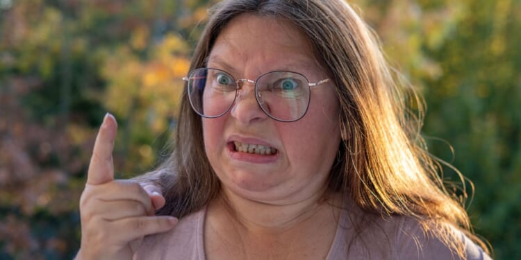 Liberal Woman Escorted Off Plane After Outburst on Lawmaker-Filled Flight [WATCH]