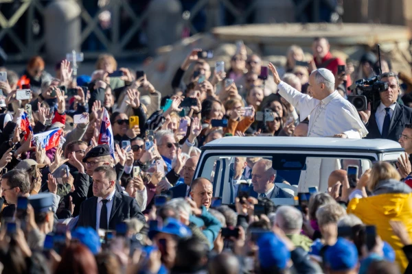 Pope Leo XIV waves at the crowds gathered in St. Peter's Square for his general audience on Nov. 12, 2025. Credit: Daniel Ibanez/CNA