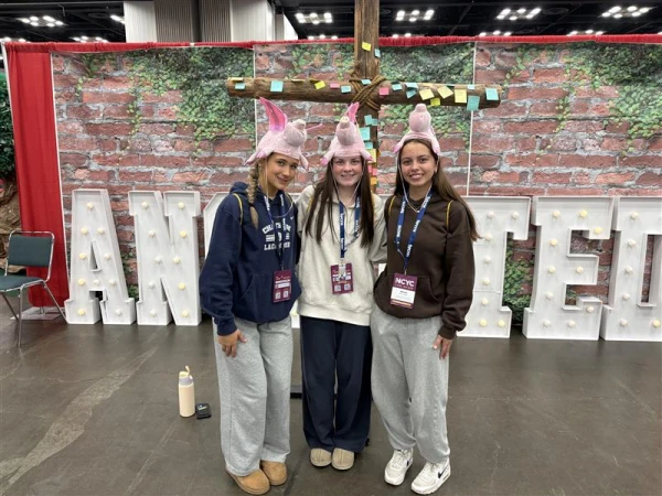 Catherine Downer, Addi Kandel, and Miriam Stebel from Dayton, Ohio, during the first night of NCYC 2025 on Nov. 20, 2025, at the Indiana Convention Center in Indianapolis. Credit: Tessa Gervasini/CNA