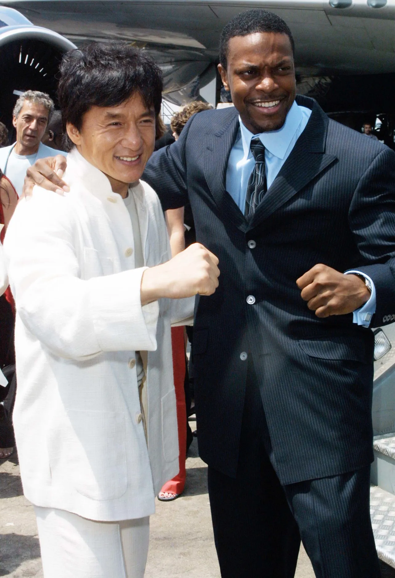 392418 06: Actors Jackie Chan, left, and Chris Tucker arrive at the launch of United Airlines 