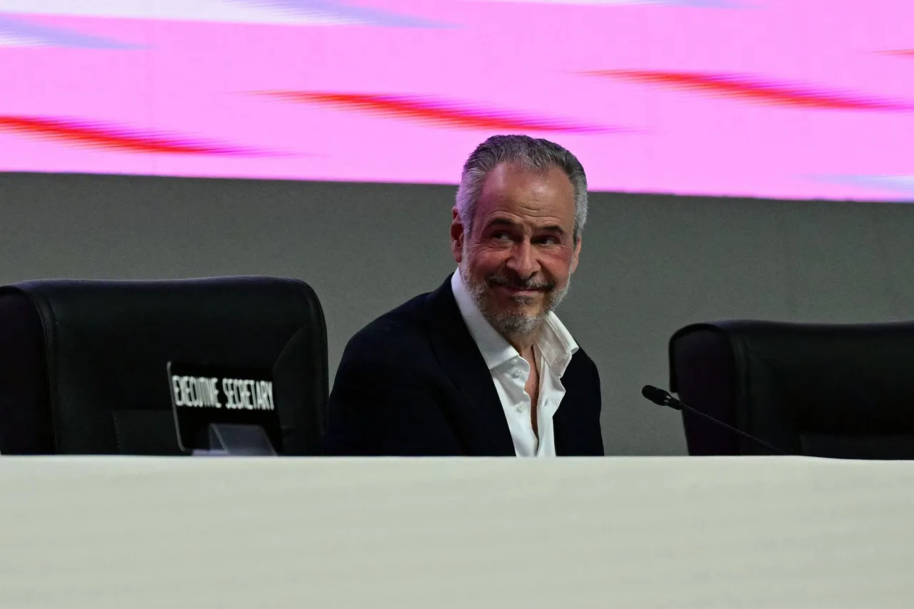 COP30 President Andre Correa do Lago listens to a speech by UN Climate chief and UNFCCC Executive Secretary Simon Stiell during the COP30 UN Climate Change Conference opening ceremony in Belem, Para State, Brazil on November 10, 2025. (Photo by PABLO PORCIUNCULA/AFP via Getty Images)