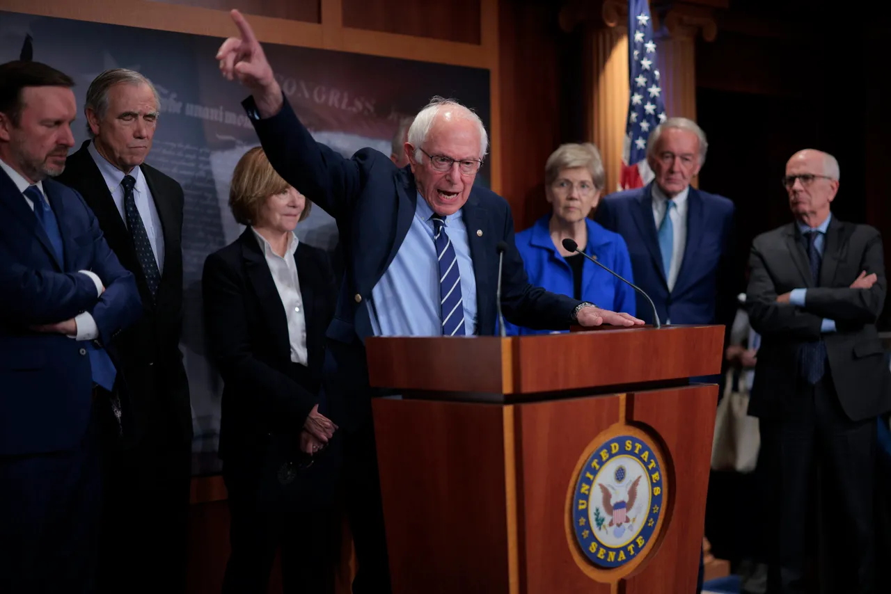 WASHINGTON, DC - OCTOBER 29: Senate Health, Education, Labor and Pensions Committee ranking member Bernie Sanders (I-VT) (C) holds a news conference with (L-R) Sen. Chris Murphy (D-CT), Sen. Jeff Merkley (D-OR), Sen. Tina Smith (D-MN), Sen. Elizabeth Warren (D-MA), Sen. Edward Markey (D-MA) and Sen. Peter Welch (D-VT) on the 29th day of the federal government shutdown at the U.S. Capitol on October 29, 2025 in Washington, DC. The Democratic senator demanded that the Trump administration pay the cost of the Supplemental Nutrition Assistance Program (SNAP) and Women, Infants, and Children (WIC) during the shutdown, making it possible for more than 42 million people to afford groceries. (Photo by Chip Somodevilla/Getty Images)