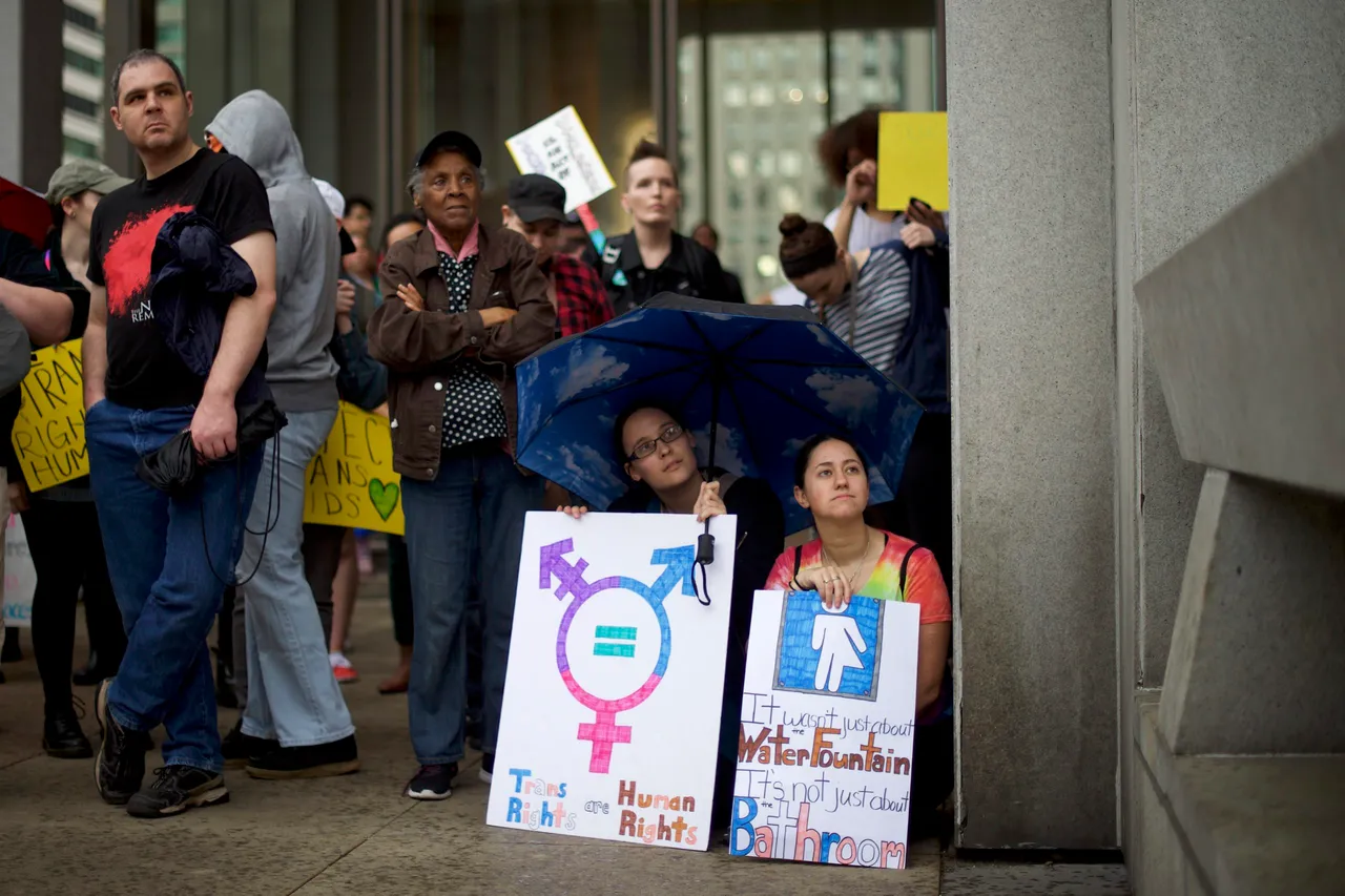 Protestors demonstrate during a rally against the transgender bathroom rights repeal at Thomas Paine Plaza February 25, 2017 in Philadelphia, Pennsylvania