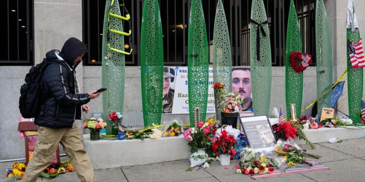 National Guard shooting victim awake and responsive