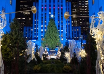 The Rockefeller Center Christmas tree, a holiday icon, lights up in New York