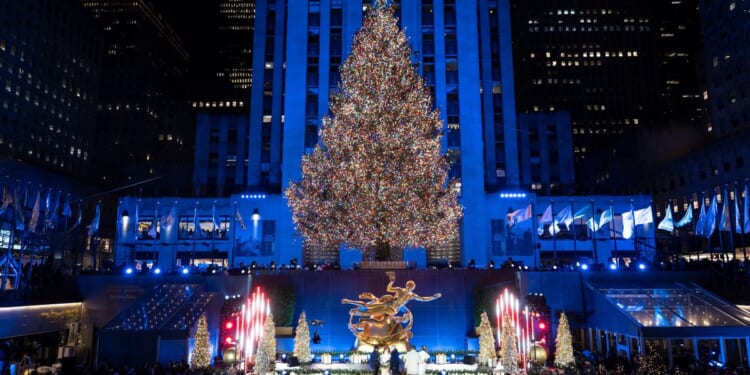Rockefeller Center Christmas tree illuminated in New York