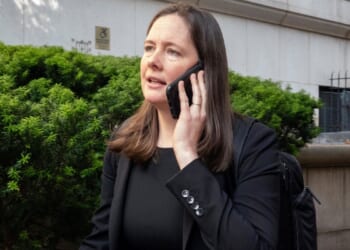 Judge to decide if ex-prosecutor Maurene Comey's wrongful termination claims belong in court