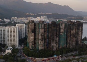 Hong Kong man arrested for posts about deadly high-rise fire, criticizing authority