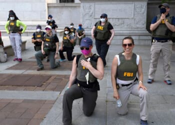 Former FBI agents, fired for kneeling during racial justice protest, sue for reinstatement