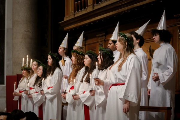 Students from Nordiska Musikgymnasiet — The Nordic Music High School — in Stockholm perform traditional Swedish “Lucia songs” during an afternoon Mass in St. Peter’s Basilica on Dec. 11, 2025. Credit: Bénédicte Cedergren/EWTN News