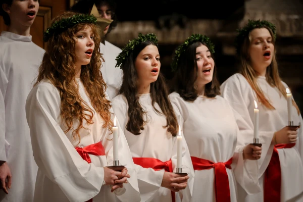 Students from Nordiska Musikgymnasiet — The Nordic Music High School — in Stockholm perform traditional Swedish “Lucia songs” during an afternoon Mass in St. Peter’s Basilica on Dec. 11, 2025. Credit: Bénédicte Cedergren/EWTN News
