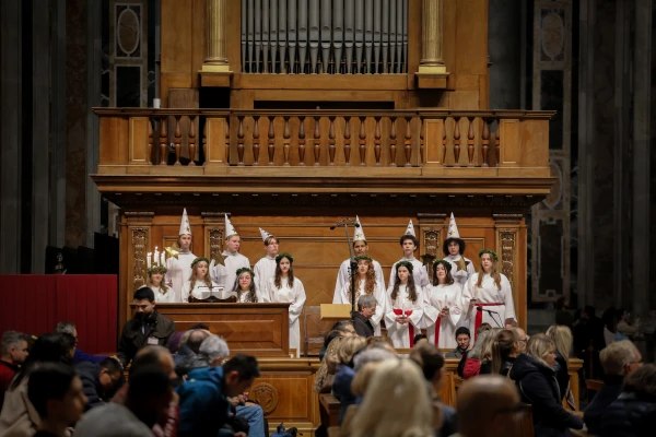 Students from Nordiska Musikgymnasiet — The Nordic Music High School — in Stockholm perform traditional Swedish “Lucia songs” during an afternoon Mass in St. Peter’s Basilica on Dec. 11, 2025. Credit: Bénédicte Cedergren/EWTN News