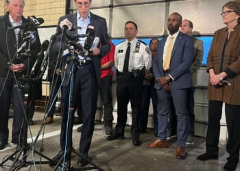 Police have person of interest in custody over Brown University shooting that killed 2, wounded 9