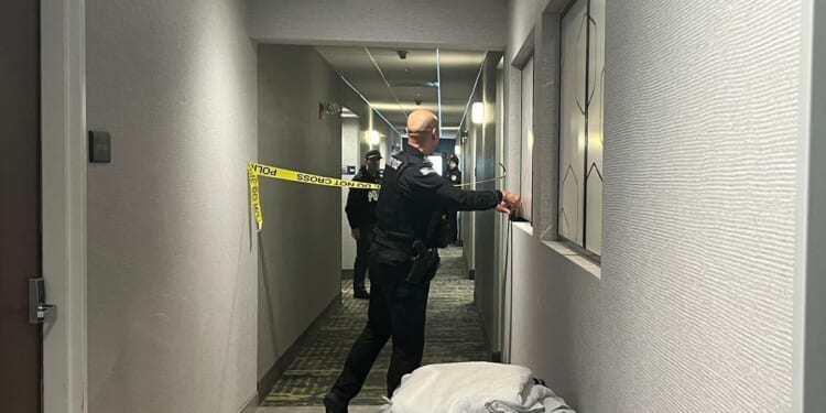 Person of interest in custody after shooting at Brown University kills two and wounds nine others