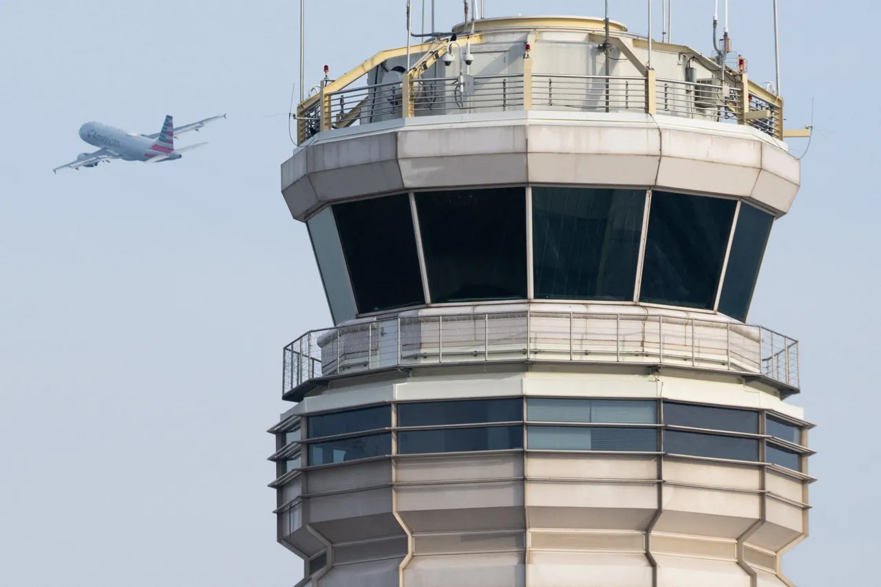 An American Airlines Airbus A319 airplane takes off past the air traffic control tower at Ronald Reagan Washington National Airport in Arlington, Virginia, January 11, 2023. The US Federal Aviation Authority said Wednesday that normal flight operations 