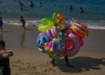 Trump's oil blockade threat creates anxiety in Venezuela, but people stick to their daily lives