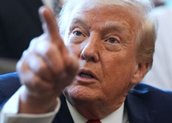 Trump signs defense policy bill into law