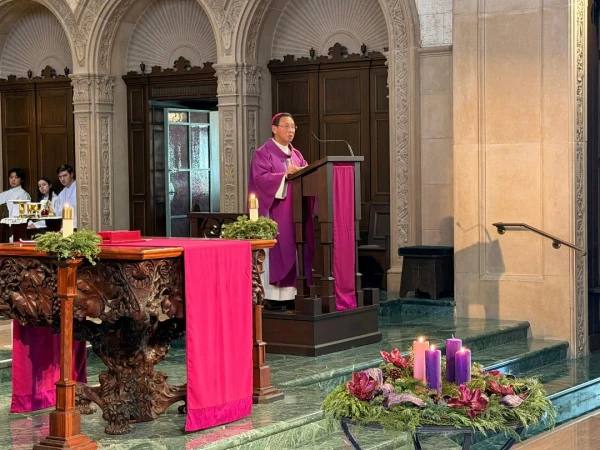 Bishop of San Diego Michael Pham dedicates “Angels Unawares,” a new sculpture on the campus of the University of San Diego, on Dec. 18, 2025. The 8-foot-tall bronze sculpture is a scaled version of one in St. Peter’s Square in Rome that was commissioned by Pope Francis in 2019. Credit: Jim Graves