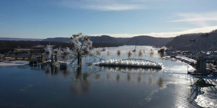 Implosion takes down a nearly 100-year-old Mississippi River bridge