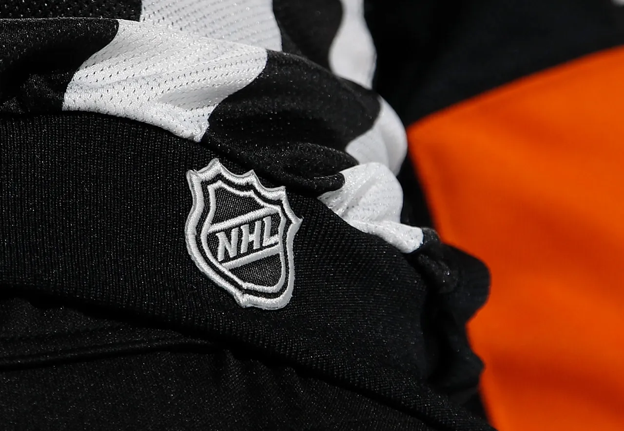 PHILADELPHIA, PENNSYLVANIA - JANUARY 11: A close-up view of the NHL logo worn by referee Garrett Rank #7 during the game between the Philadelphia Flyers and the Washington Capitals at the Wells Fargo Center on January 11, 2023 in Philadelphia, Pennsylvania. (Photo by Bruce Bennett/Getty Images )