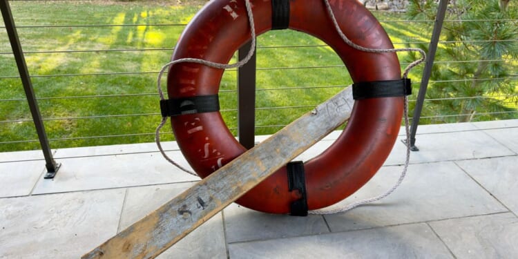 Wreck of Edmund Fitzgerald life ring, lifeboat piece sell at auction for $150,000