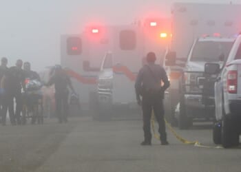 Officials respond to a small plane crash near Galveston, Texas