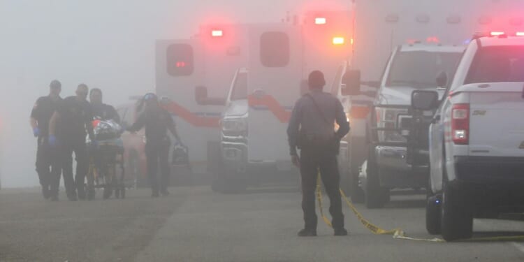 Officials respond to a small plane crash near Galveston, Texas