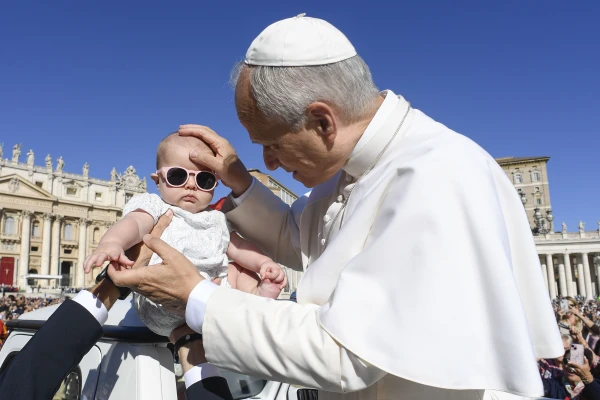 Pope Leo XIV blesses a baby during his jubilee audience on Saturday, Sept. 27, 2025, in St. Peter’s Square at the Vatican. Credit: Vatican Media