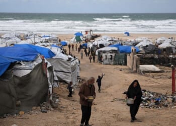 Rain floods Gaza camps as Benjamin Netanyahu heads for U.S. meeting