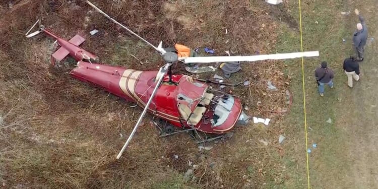 Officials say one person is dead and another is injured after two helicopters crash in New Jersey