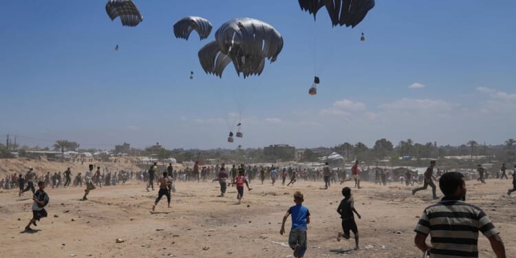 Israel revoking licenses from aid groups inside Gaza that won't identify their staff