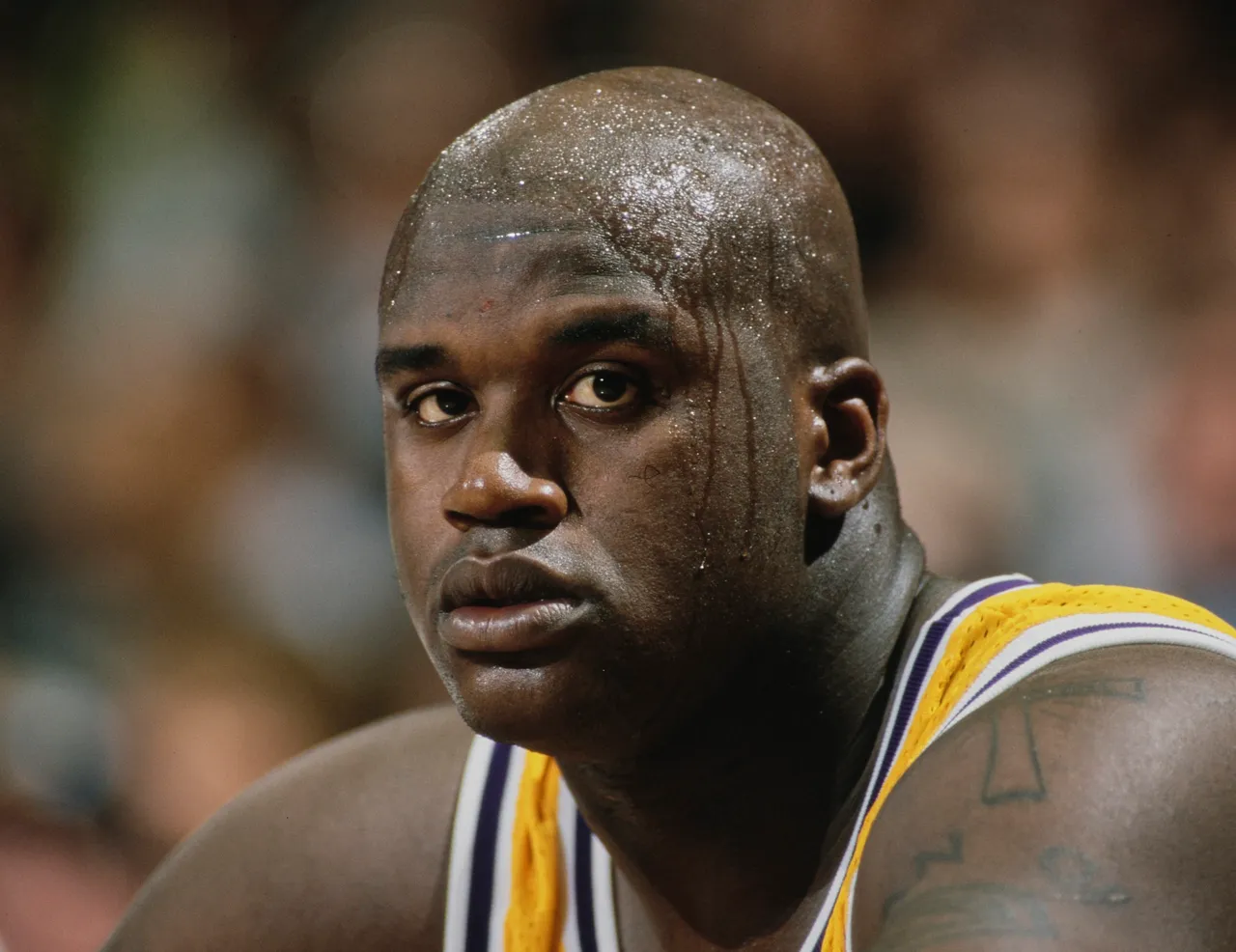 Shaquille O'Neal #34, Center for the Los Angeles Lakers during the NBA Pacific Division basketball game against the Phoenix Suns on 11th April 1997 at the Great Western Forum arena in Inglewood, Los Angeles, California, United States. The Lakers won the game 114 - 98. (Photo by Jamie Squire/Allsport/Getty Images)