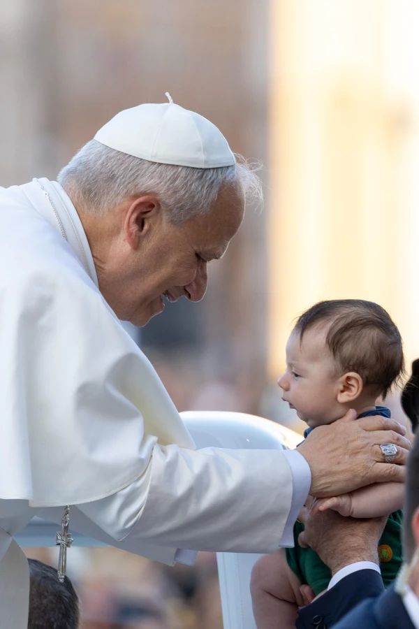 Pope Leo XIV greets a young attendee at a Pentecost prayer vigil in St. Peter’s Square, Saturday, June 7, 2025. Credit: Daniel Ibáñez/CNA