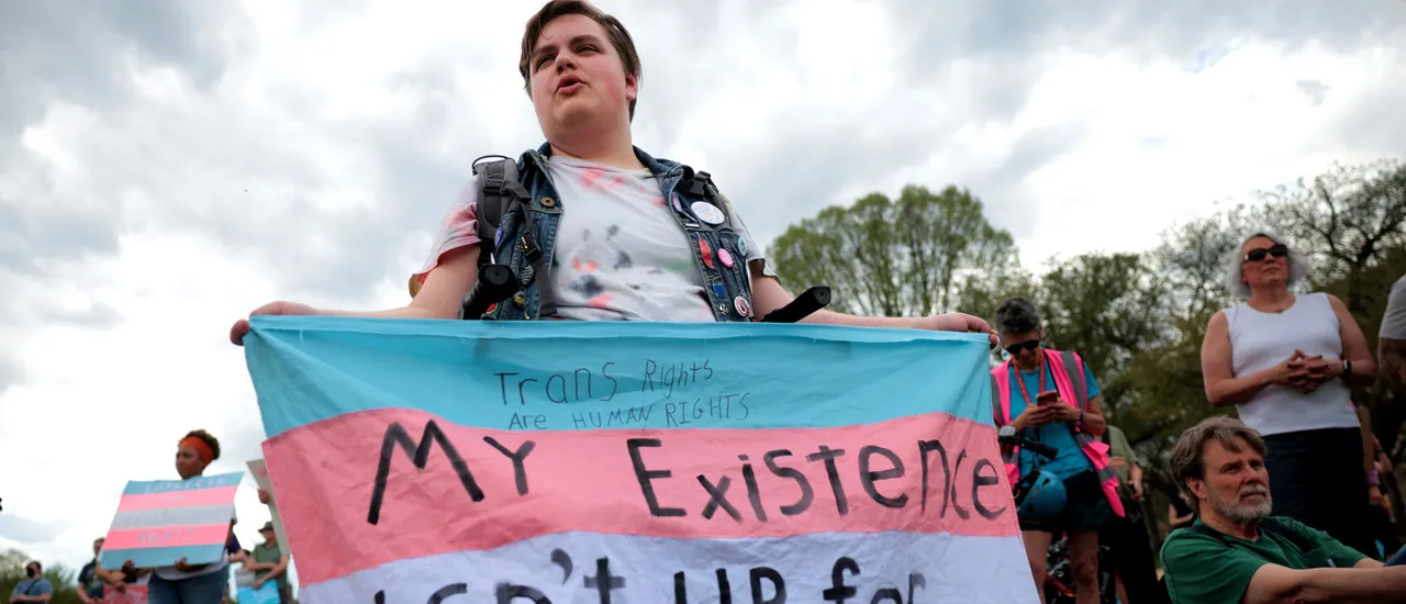 WASHINGTON, DC - MARCH 31: Jamie Brooks, 21, of Virginia, protests with fellow activists during a the Trans Day Of Visibility rally on the National Mall on March 31, 2025 in Washington City. Trans, non-binary, and gender-expansive people and supporters took part in rallies around the country to fight for trans rights and equality on International Transgender Day of Visibility. (Photo by Kayla Bartkowski/Getty Images)