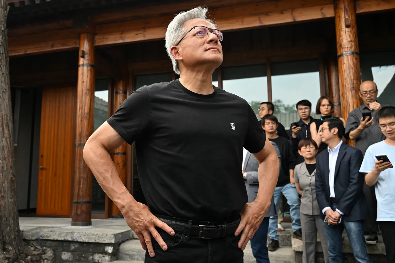 Nvidia CEO Jensen Huang speaks to journalists as he arrives for a press conference at a hotel in Beijing on July 16, 2025.