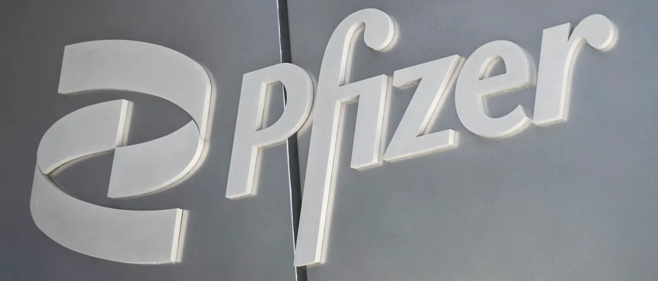 The Pfizer logo is seen outside the company's headquarters on August 8, 2025 in New York City. American pharmaceutical giant Pfizer and German biotech firm BioNTech will pay Britain's GSK and Germany's CureVac $740 million plus royalties to settle US legal disputes over Covid-19 vaccines, CureVac said Friday. (Photo by ANGELA WEISS / AFP) (Photo by ANGELA WEISS/AFP via Getty Images)