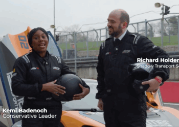 Kemi Badenoch and Ric Holden make a policy announcement - from inside a racing car